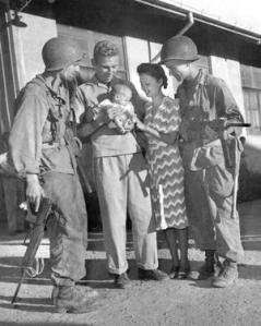 Mr. & Mrs. Hal Bowie and baby daughter Lea. Los Banos Interment Camp survivors, Laguna, Philippines 1945. (A very important picture. Please read below:)